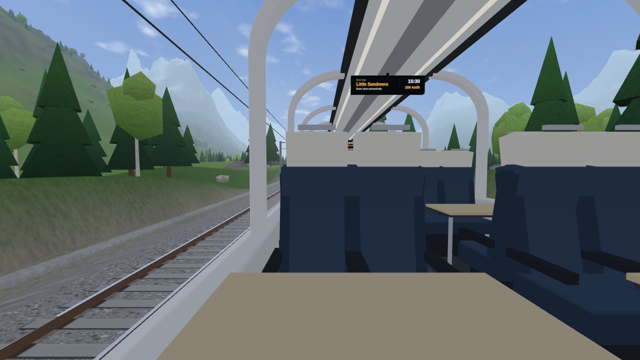 Pine forest and snowy peaks passing the window of a panorama train